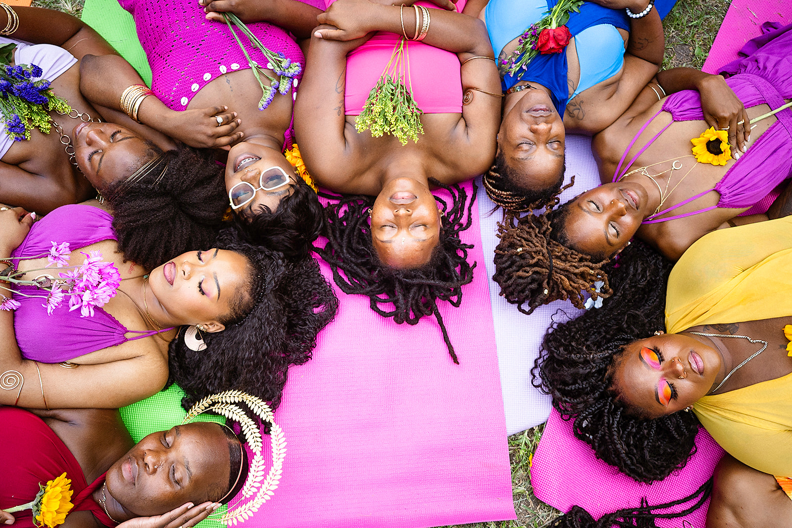 Women of The Self-Love Revival Retreat resting together in a circle